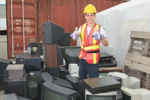 Construction site with organized waste containers in Thornton Heath